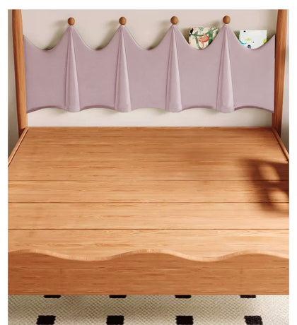  Wide wood bed boards beneath the pink scalloped headboard.