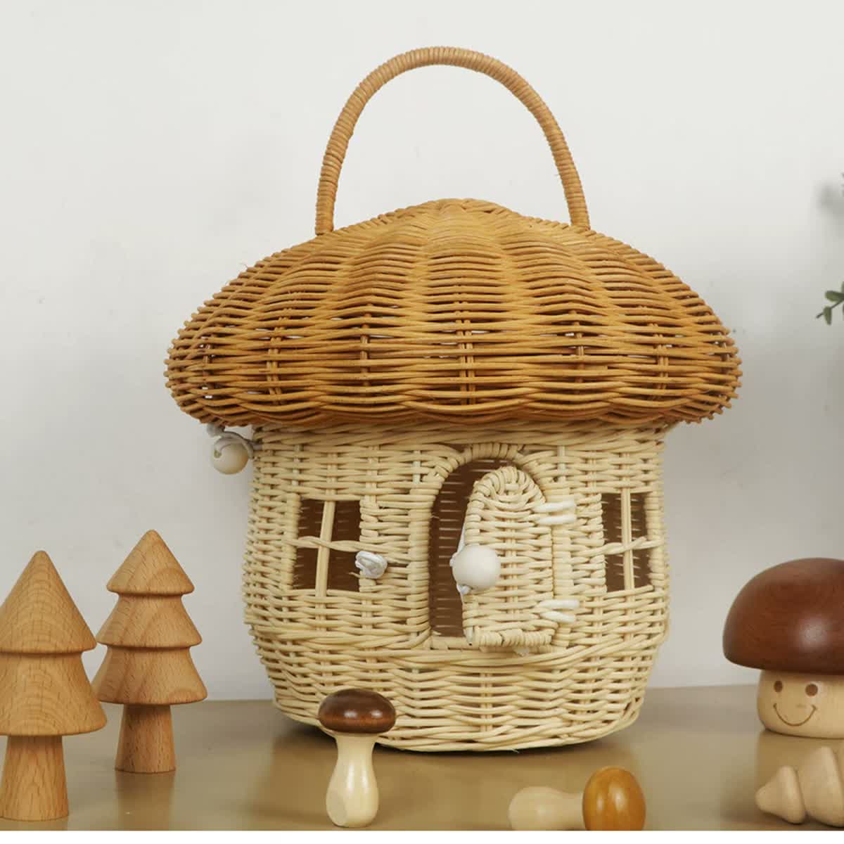 Natural Mushroom A basket with arched handle and woven house details.