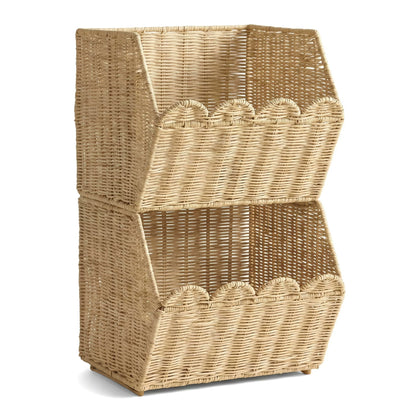  Two empty rattan baskets stacked to show the open fronts.