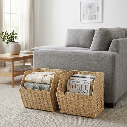  Two baskets used separately for blankets and magazines beside a sofa.