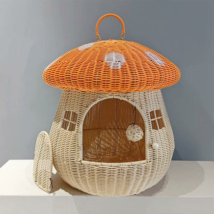  Orange-capped mushroom cat house with an open entrance.