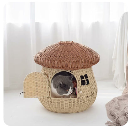  Cat resting inside the camel-colored mushroom house.