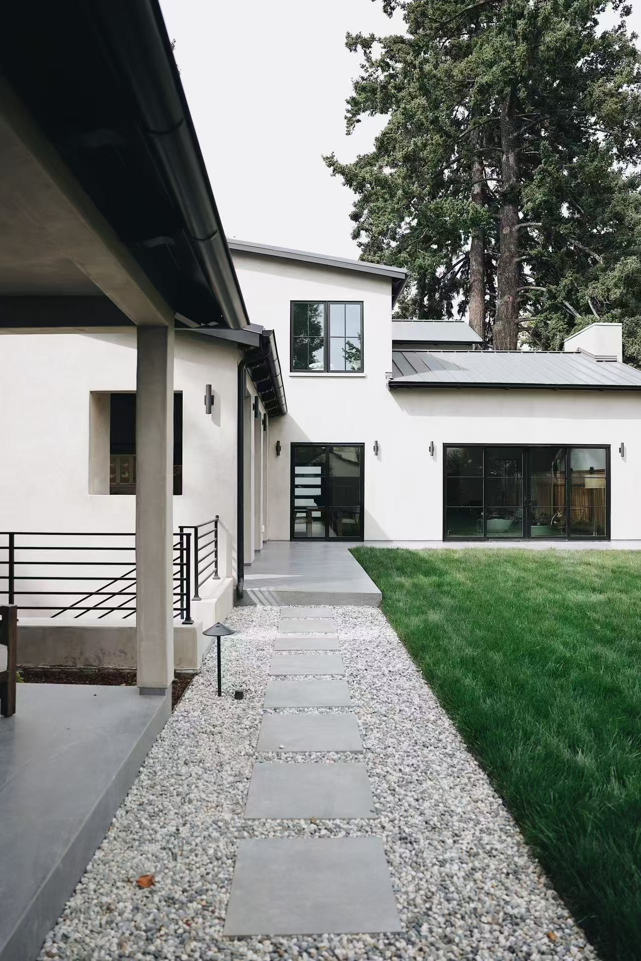 Exterior walkway connecting garden and covered area