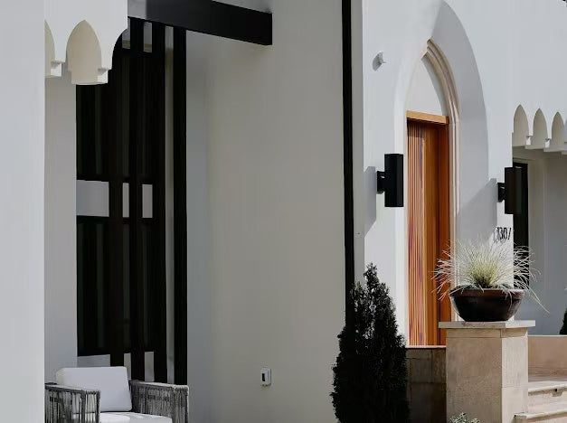 Interior view through arched door and black entry details