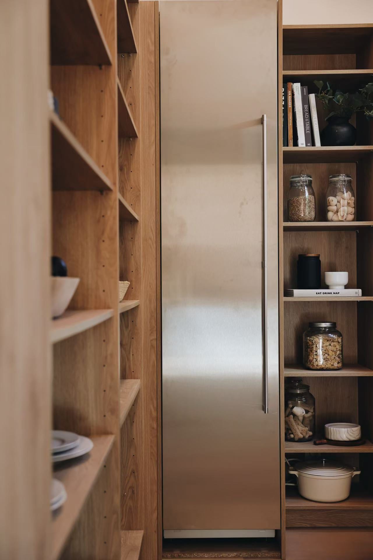 Timber shelving and tall storage detail with display objects