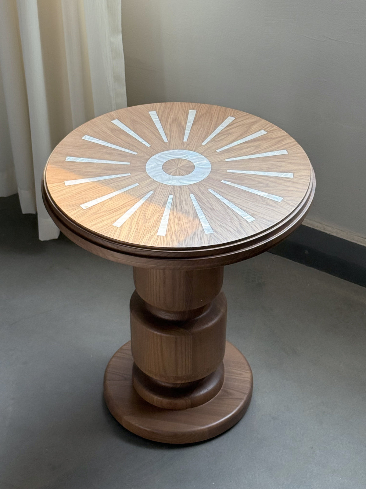 A00025 Side Table in a finished interior.