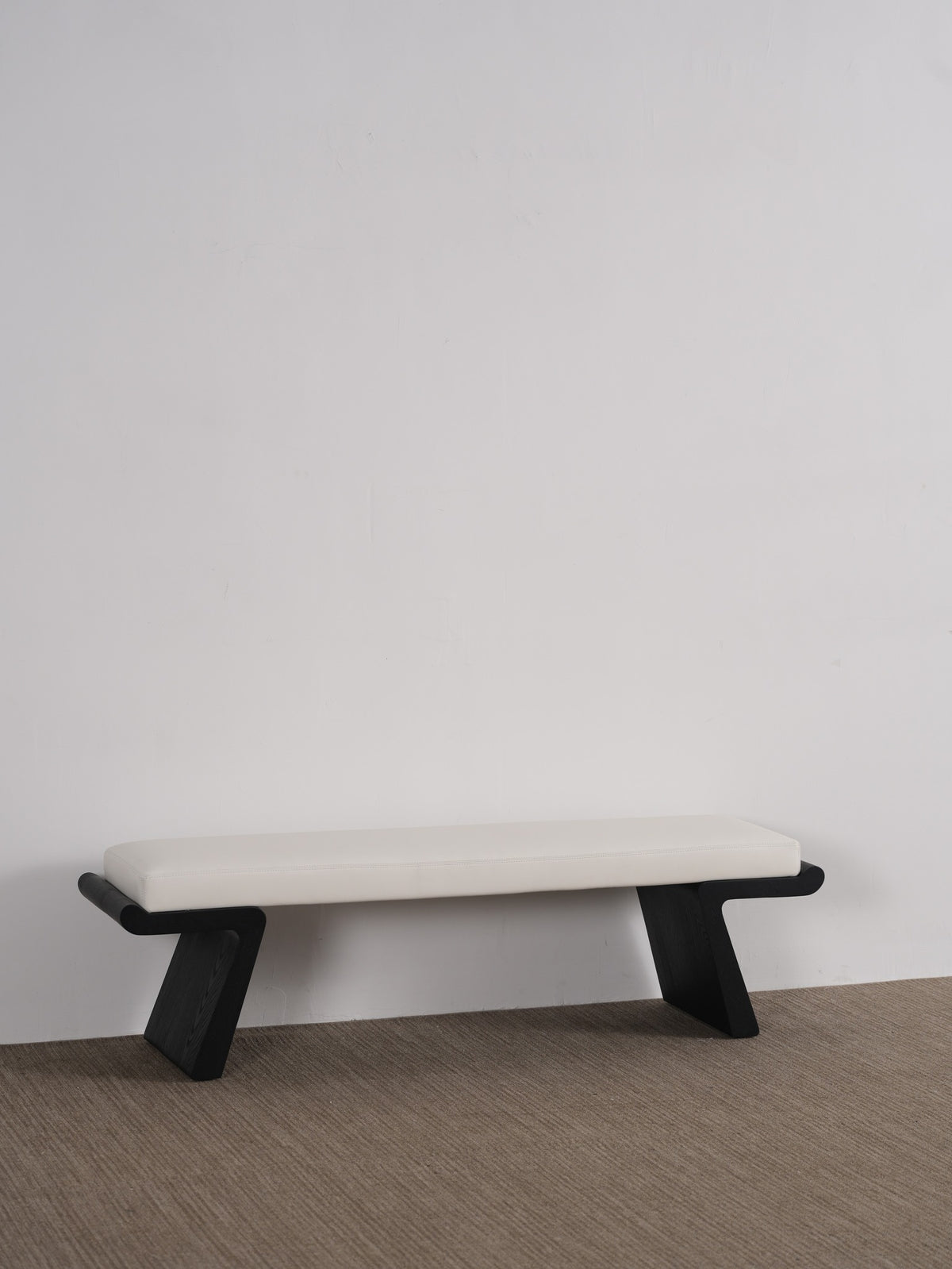 A00077 Bench in a finished interior.
