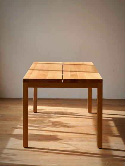 Flora Crest Dining Table — interior view 09