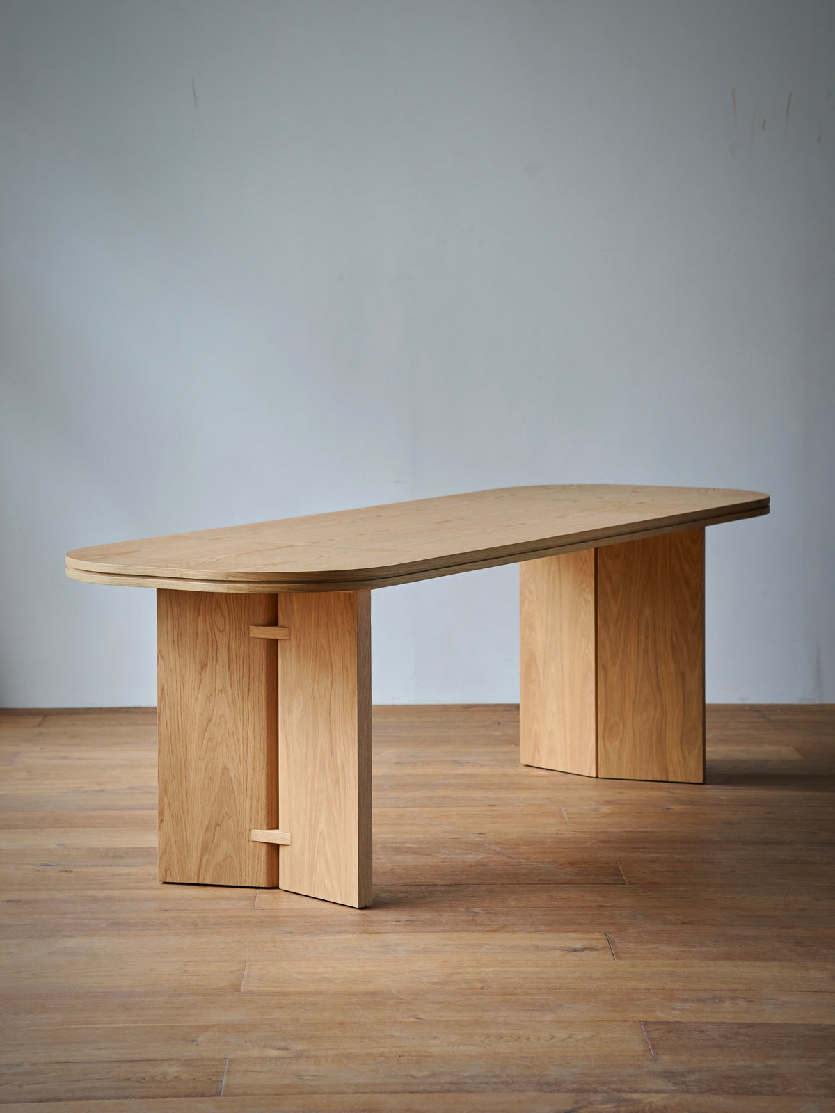 Harbor Crest Dining Table in a finished interior.
