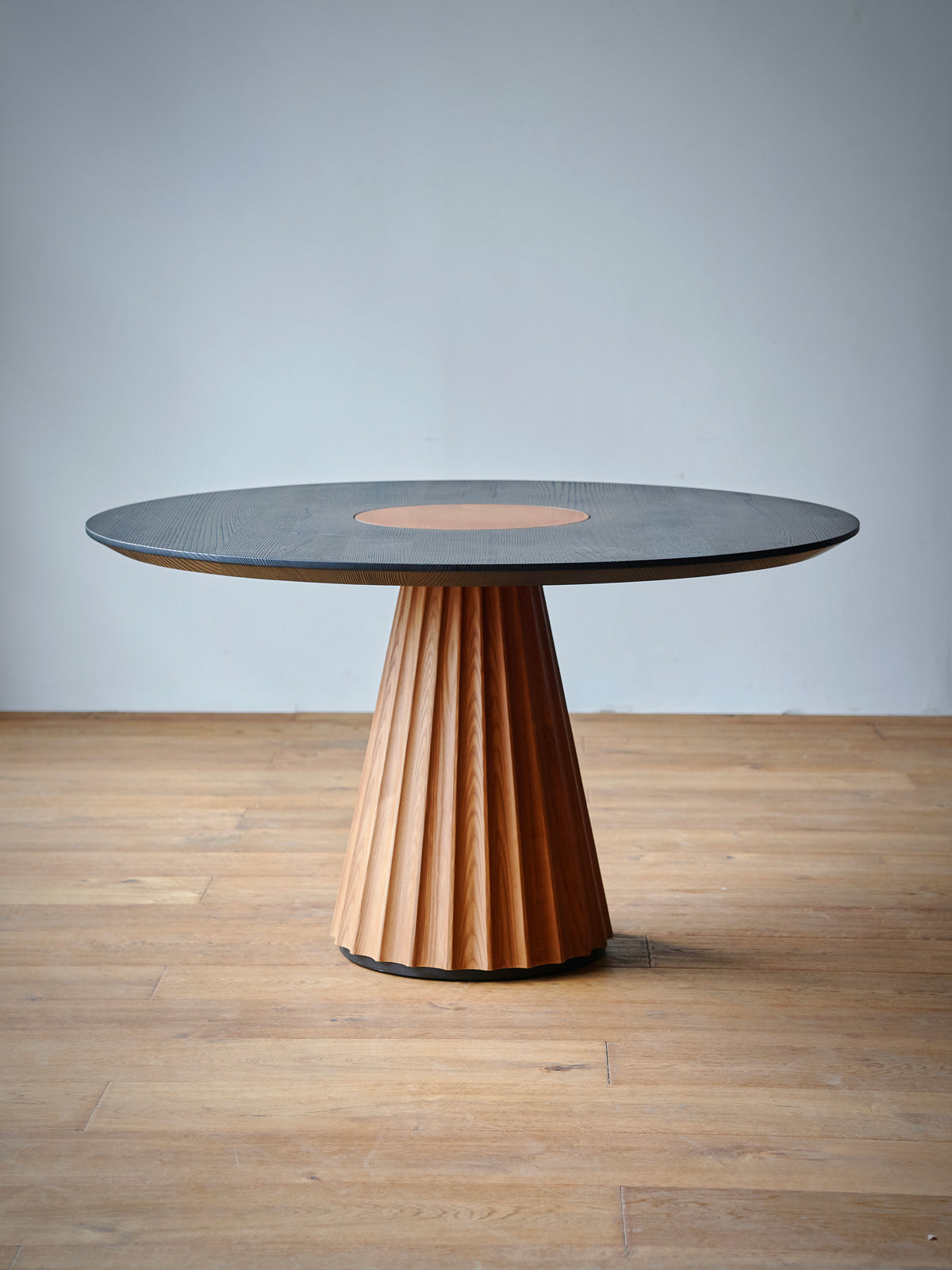Iris Crest Dining Table in a finished interior.