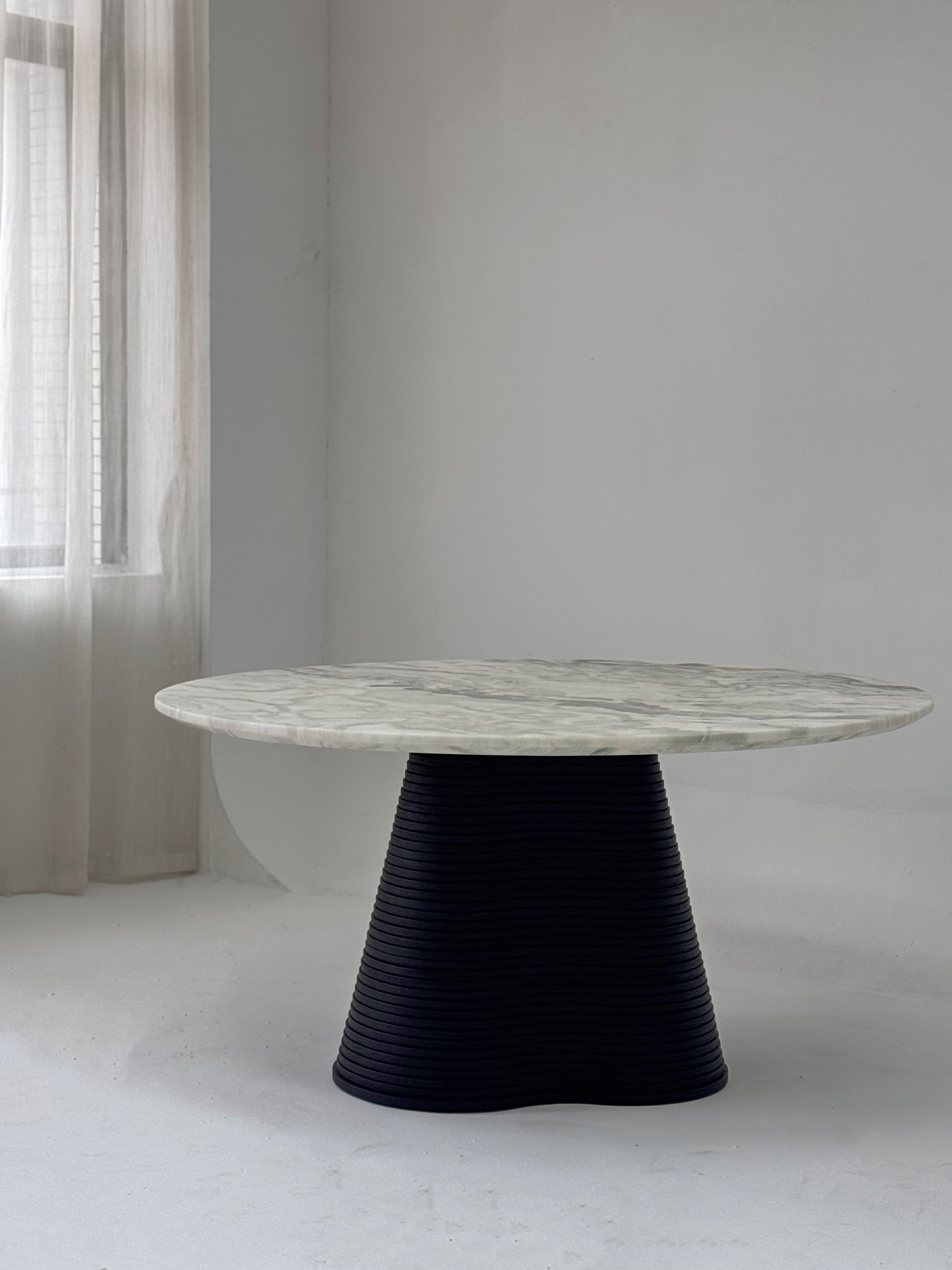Celine Field Dining Table in a finished interior.
