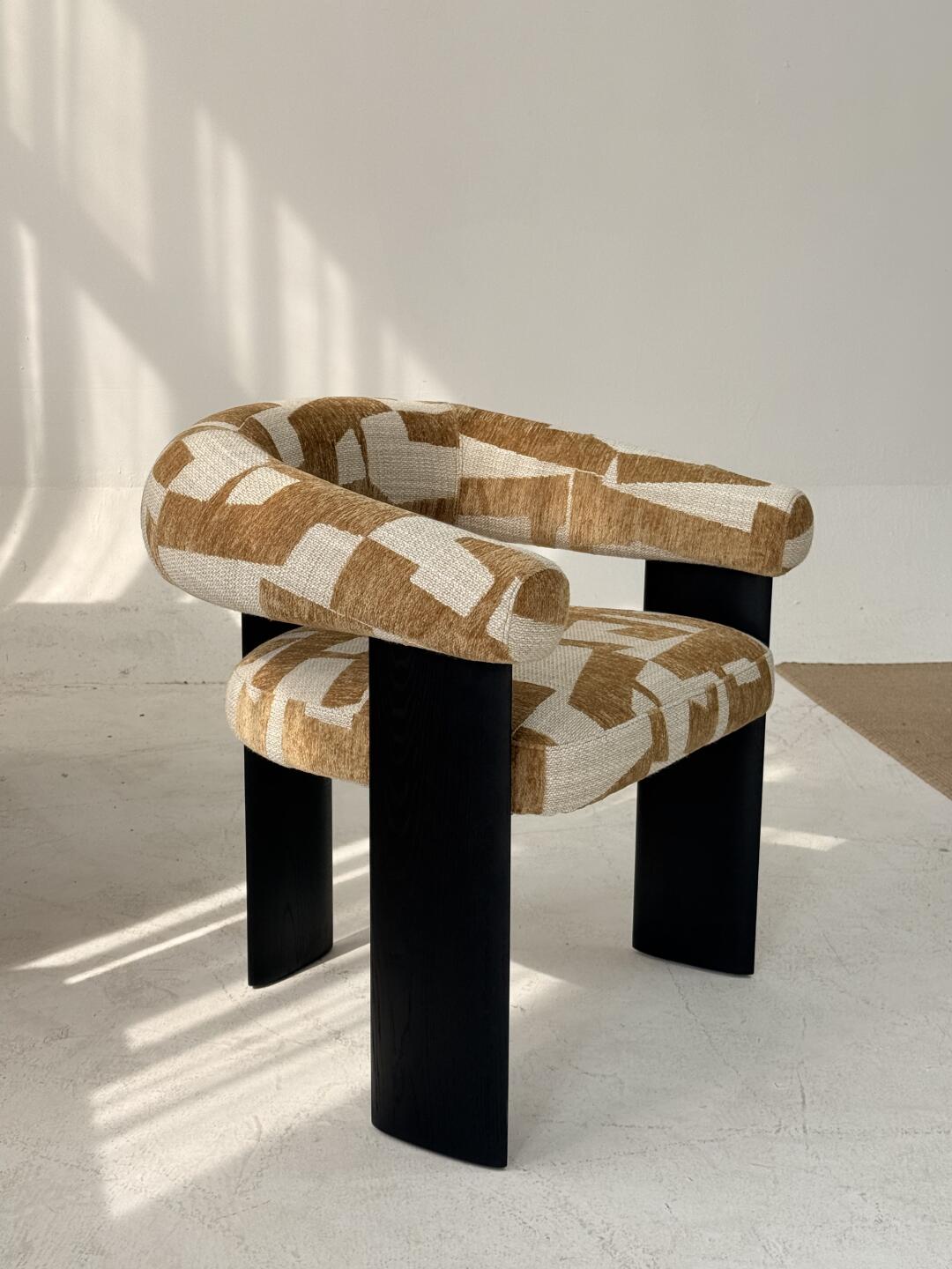 Flora Field Lounge Chair in a finished interior.