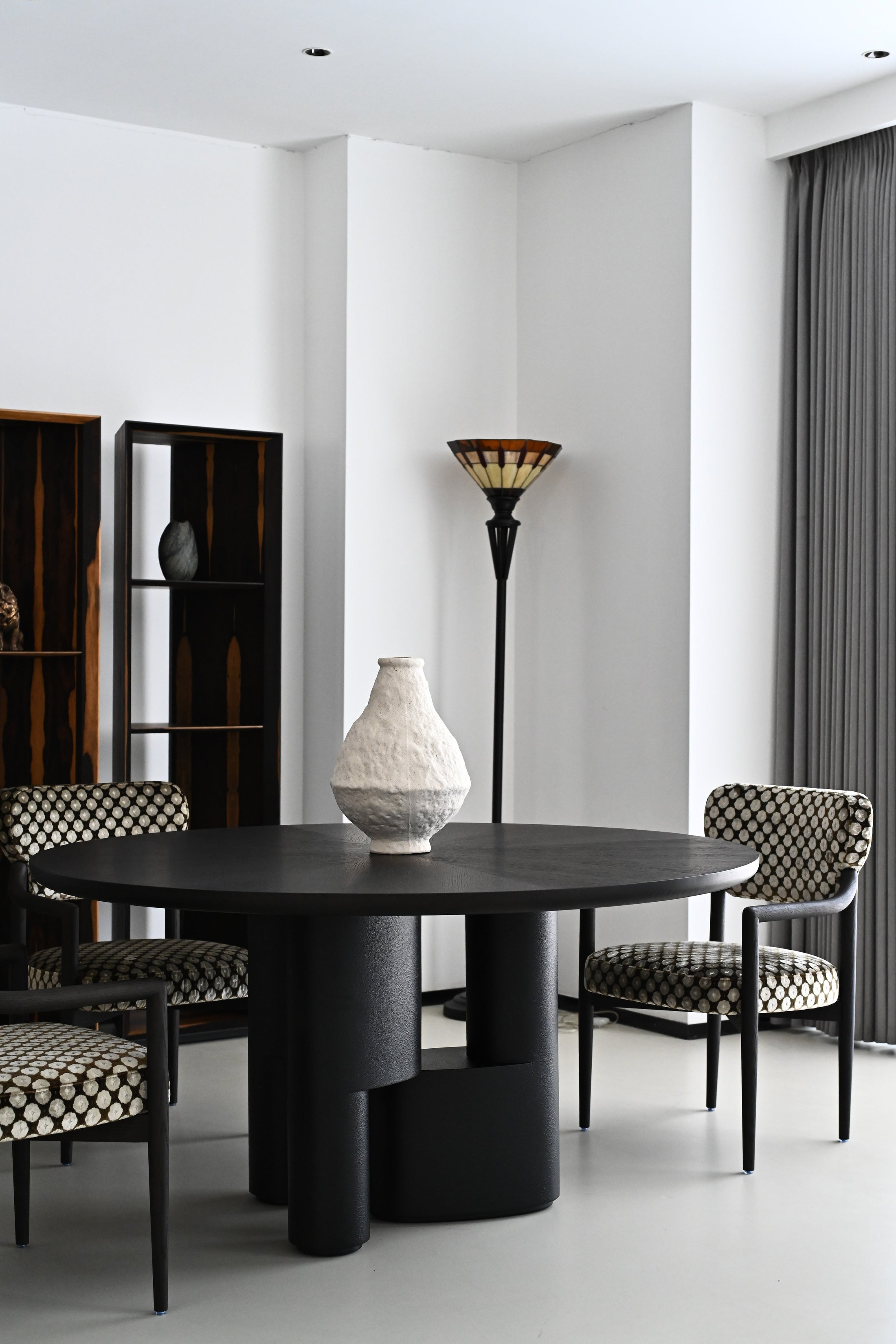 Cove Form Dining Table in a finished interior.