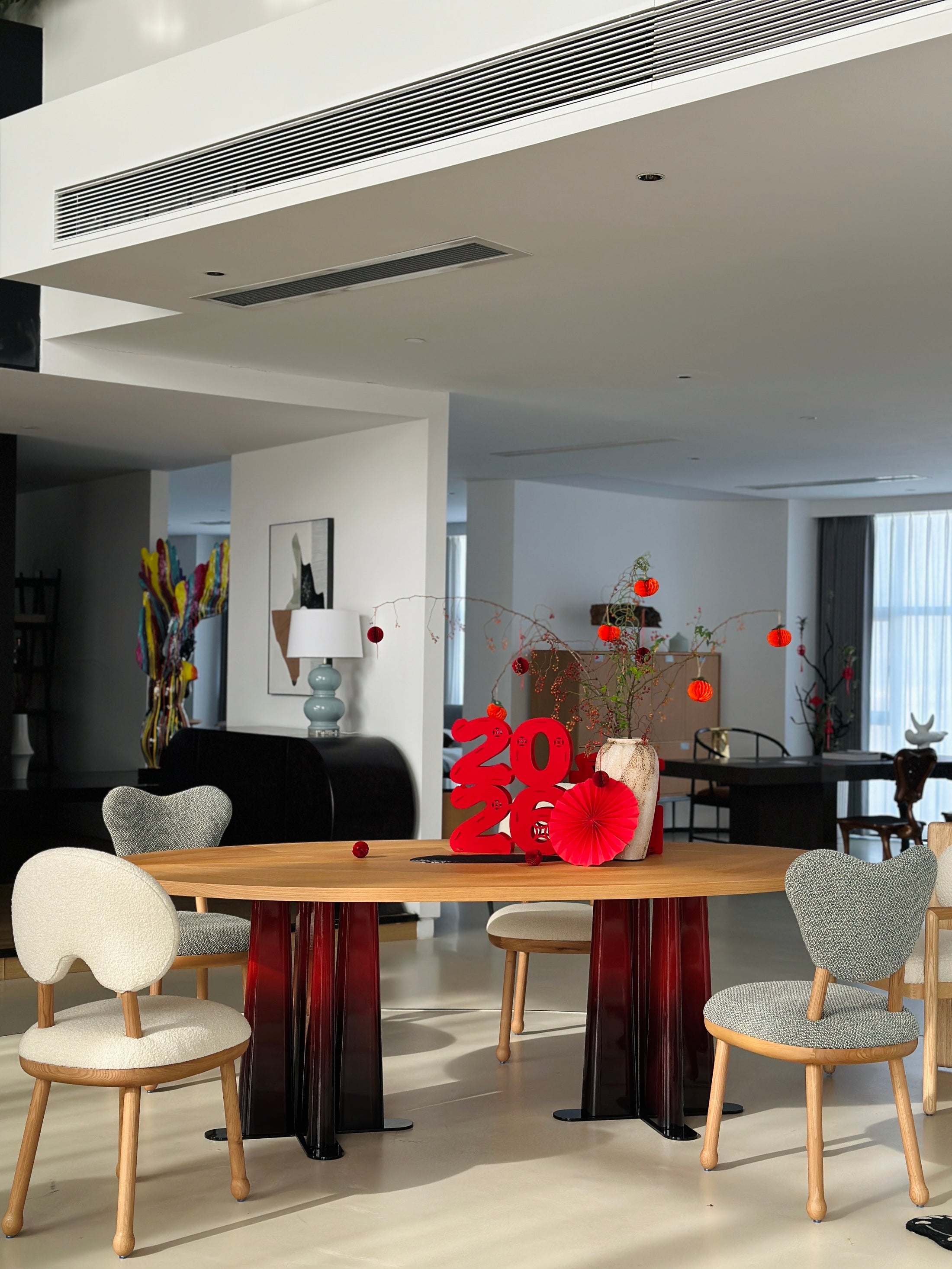 Dahlia Form Dining Table in a finished interior.