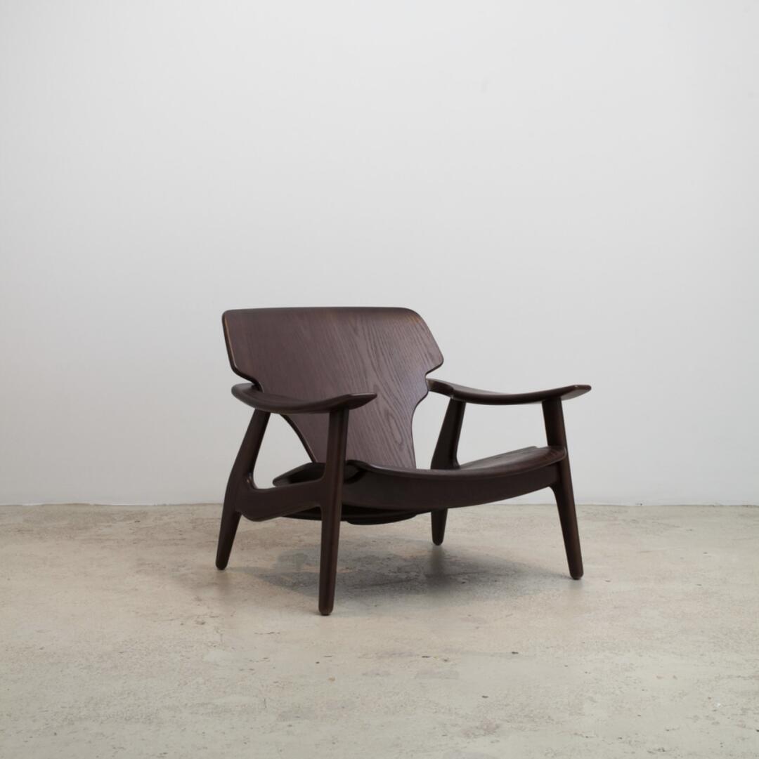 Pearl Form Armchair in a finished interior.