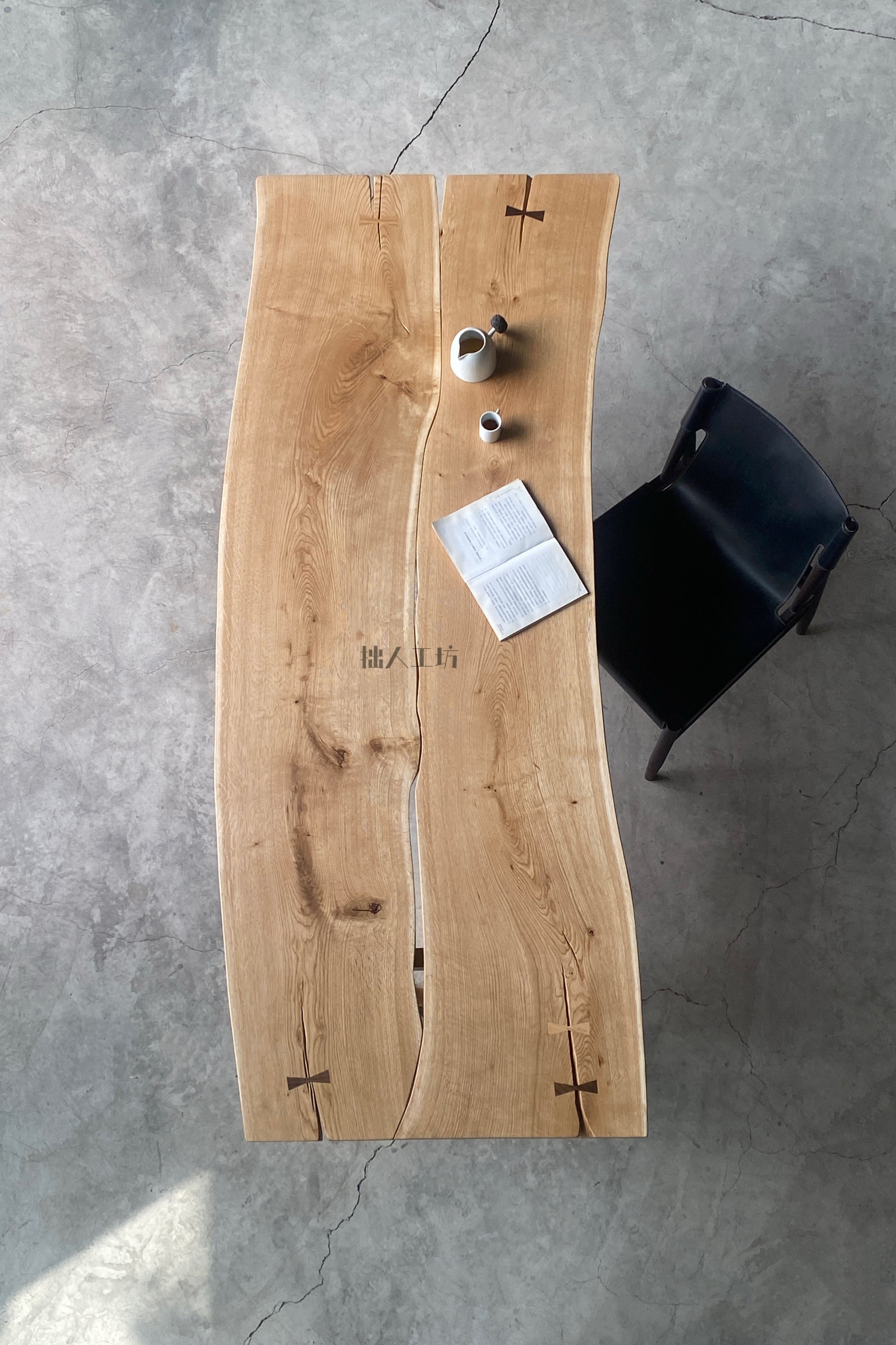 Rowan Reef Dining Table in a finished interior.