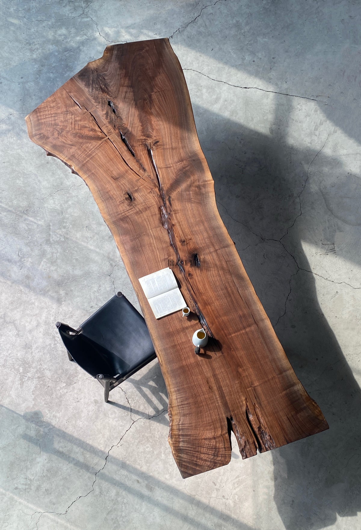 Sylvan Reef Dining Table in a finished interior.