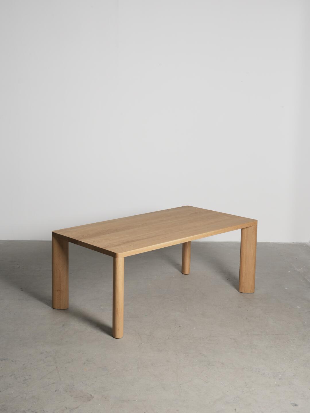 Luna Loft Dining Table in a finished interior.