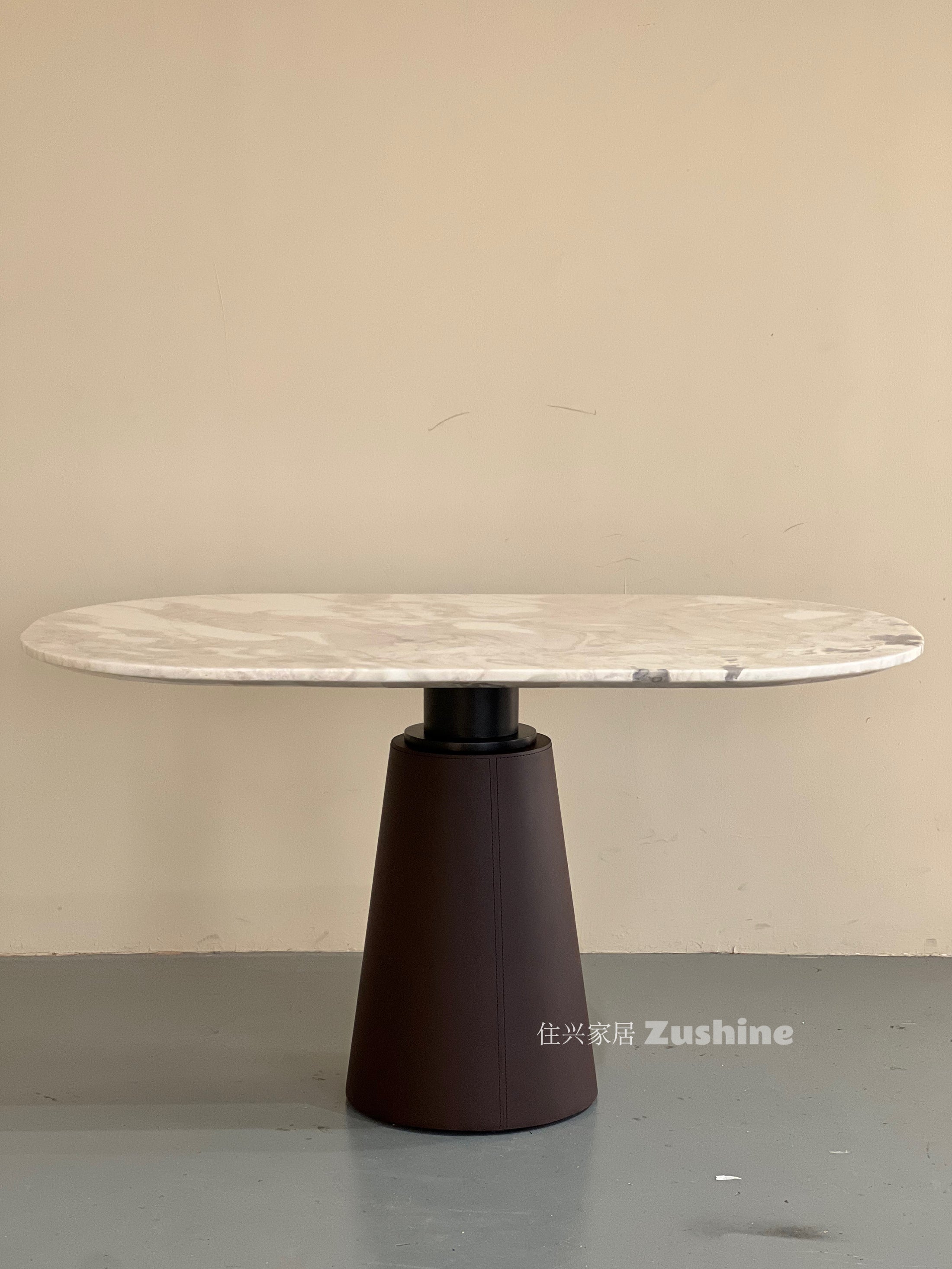 Aurelia Point Dining Table in a finished interior.