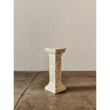 Eroded Sculpture Pedestal Table - scene