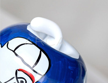 Abstract Face Hand Painted Apple Glass Ornament - scene