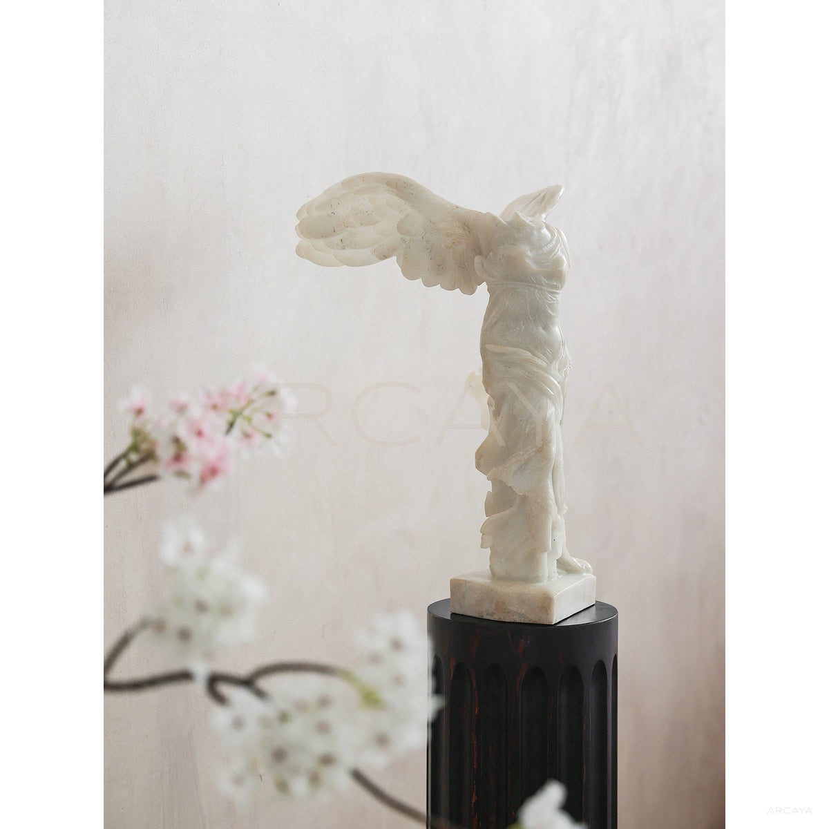 Faux Jade Winged Victory Sculpture in detail