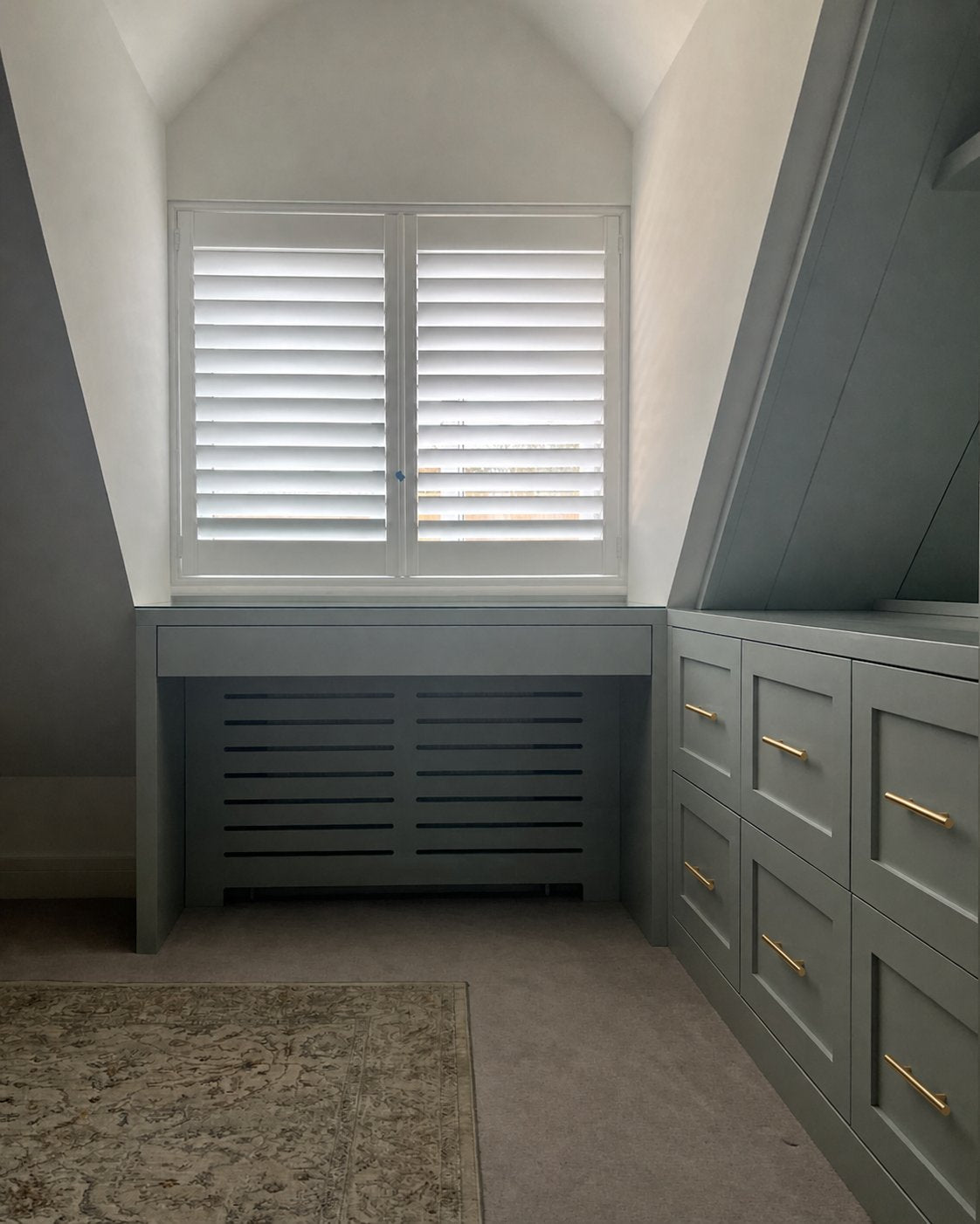 Sage Collection under-eaves storage with window seat