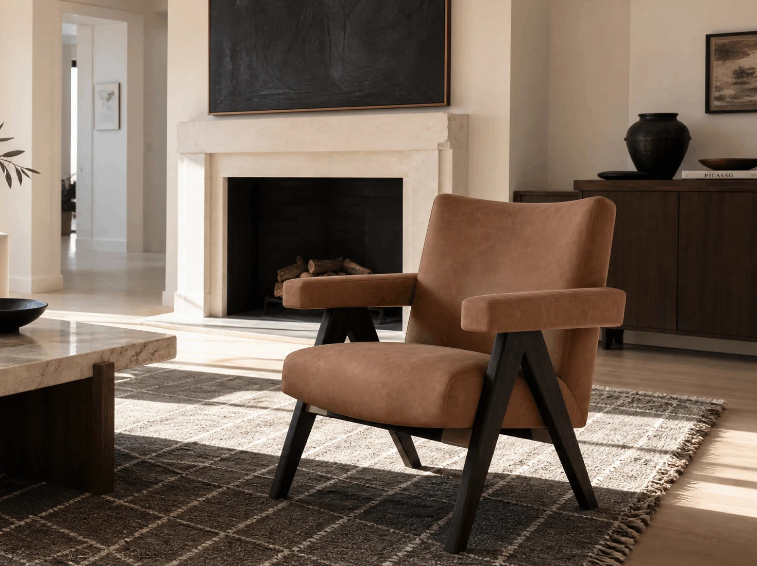 Boucle and leather lounge chairs in a contemporary interior