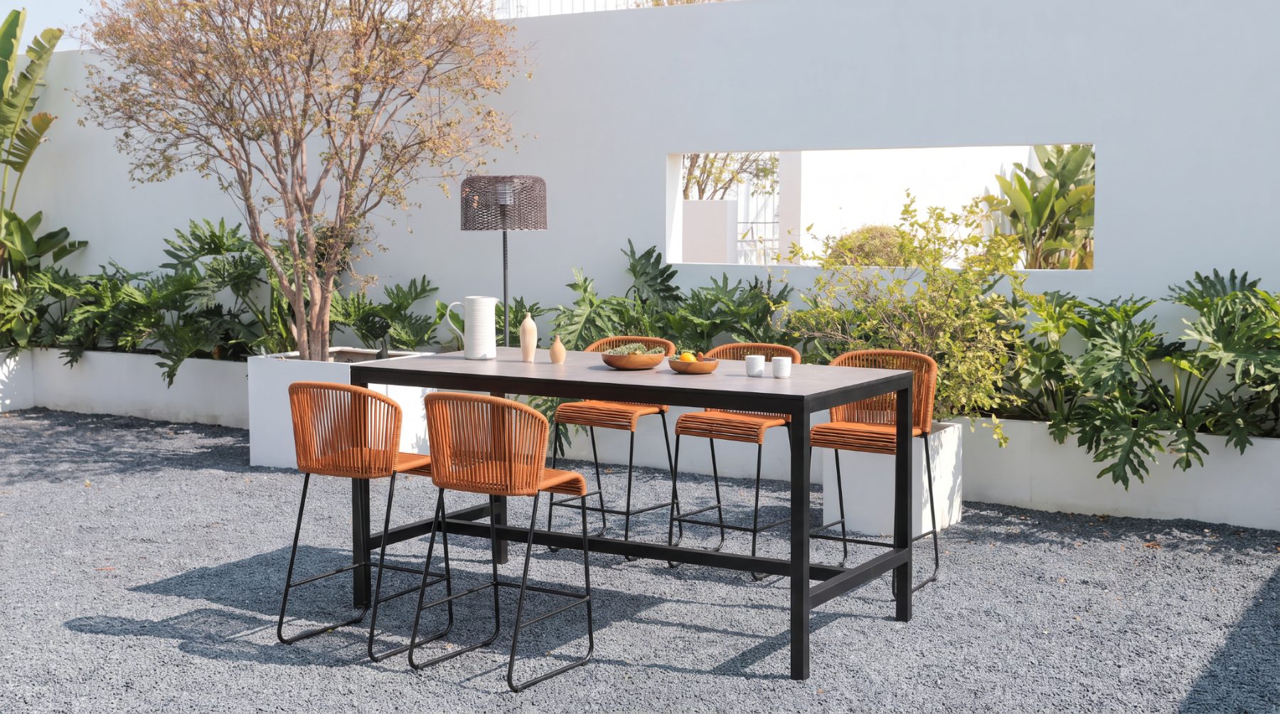 Rope bar stools at an outdoor counter