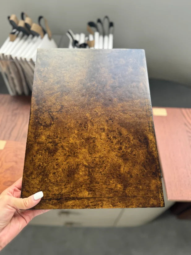 Wood veneer finish samples inspected for grain and color