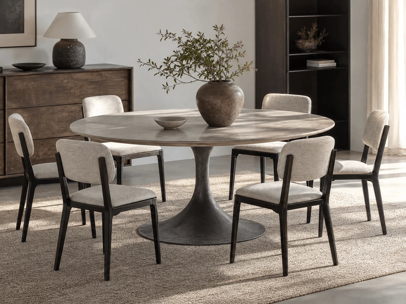 Round & Oval Dining Tables in a styled room