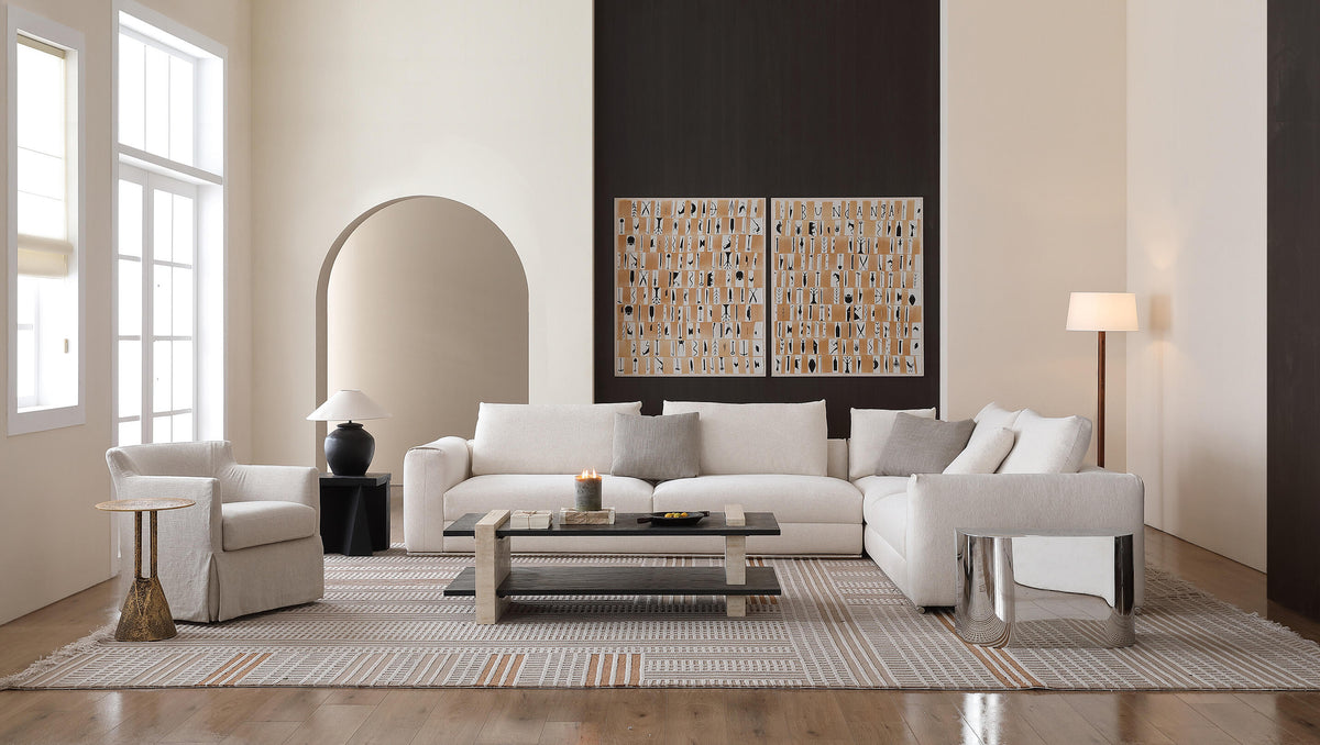 WATAI calm modern living room with white sofa and layered rug