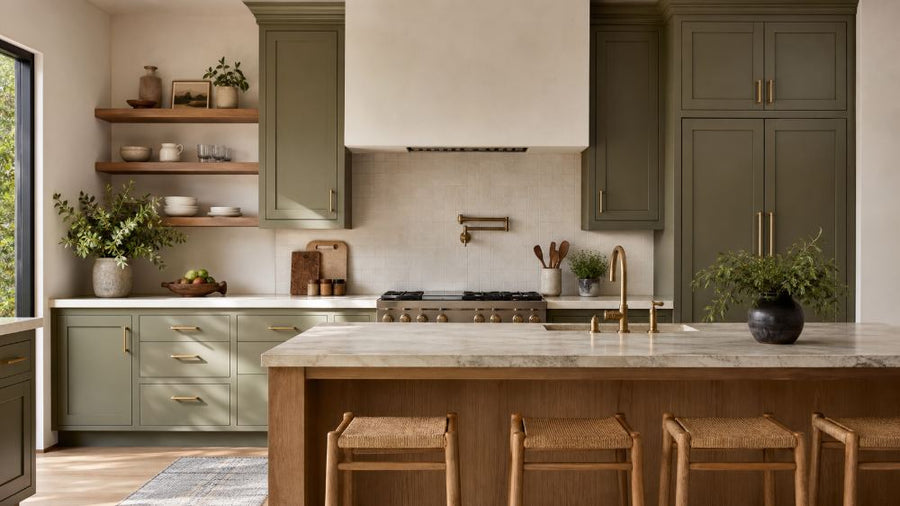 Olive green cabinets with oak island