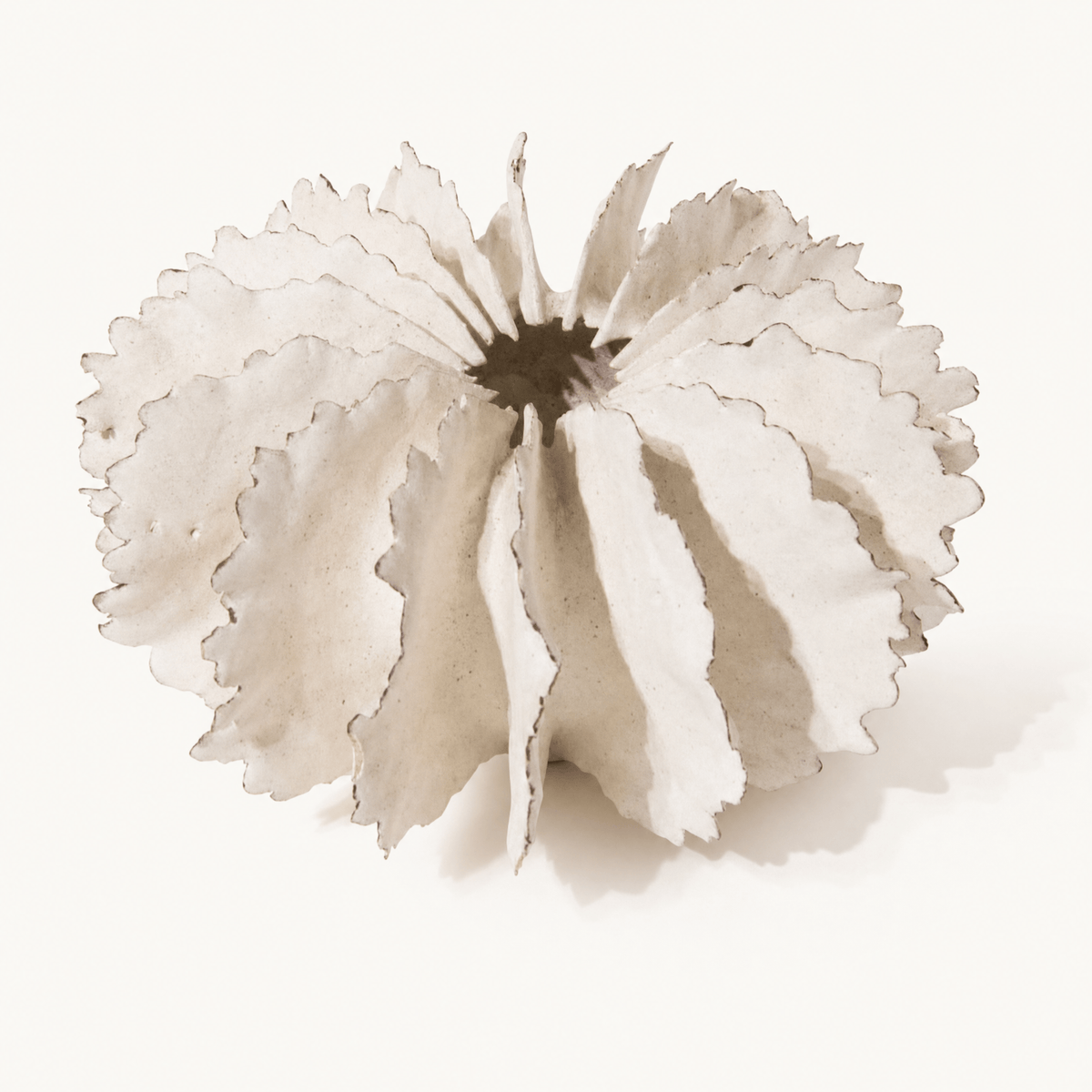 White Ruffled Ceramic Vessel