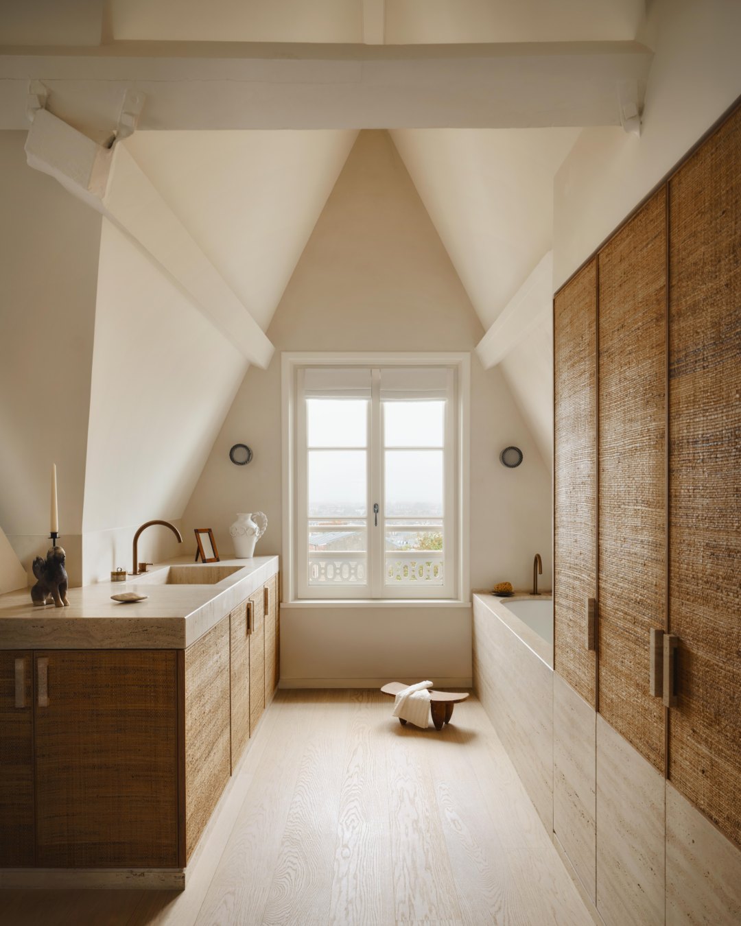 Atherton villa entry hall in warm plaster and oak