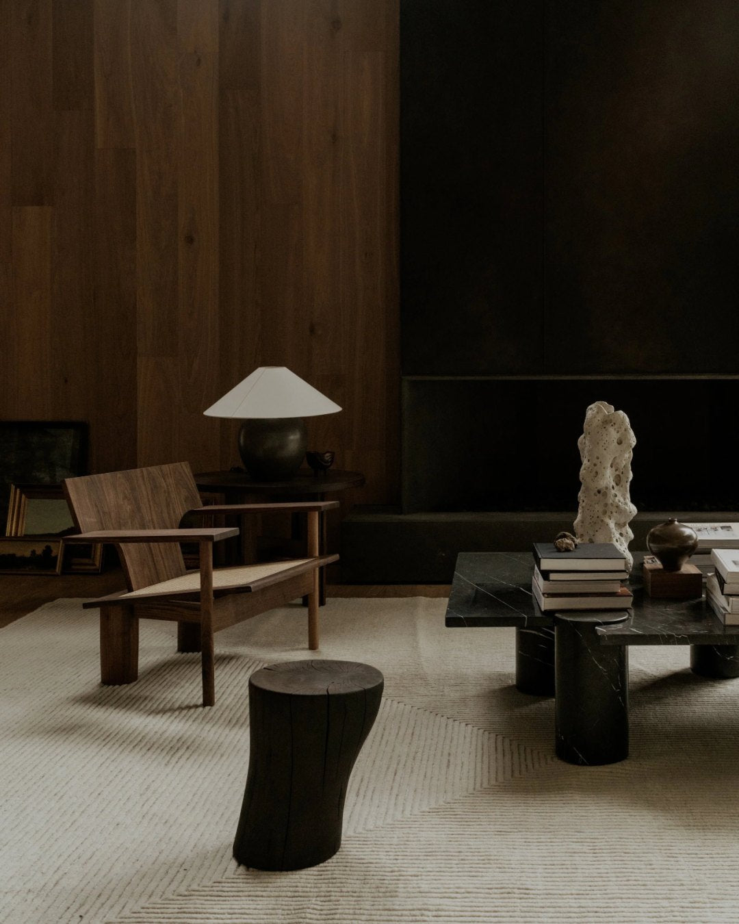 Atmospheric living area with layered, warm lighting