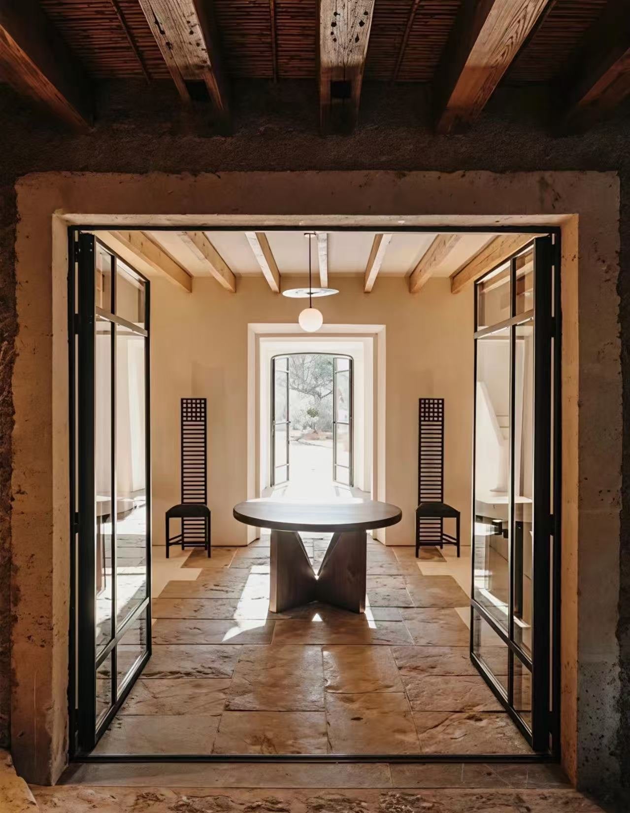 Warm timber corridor connecting rooms in the villa