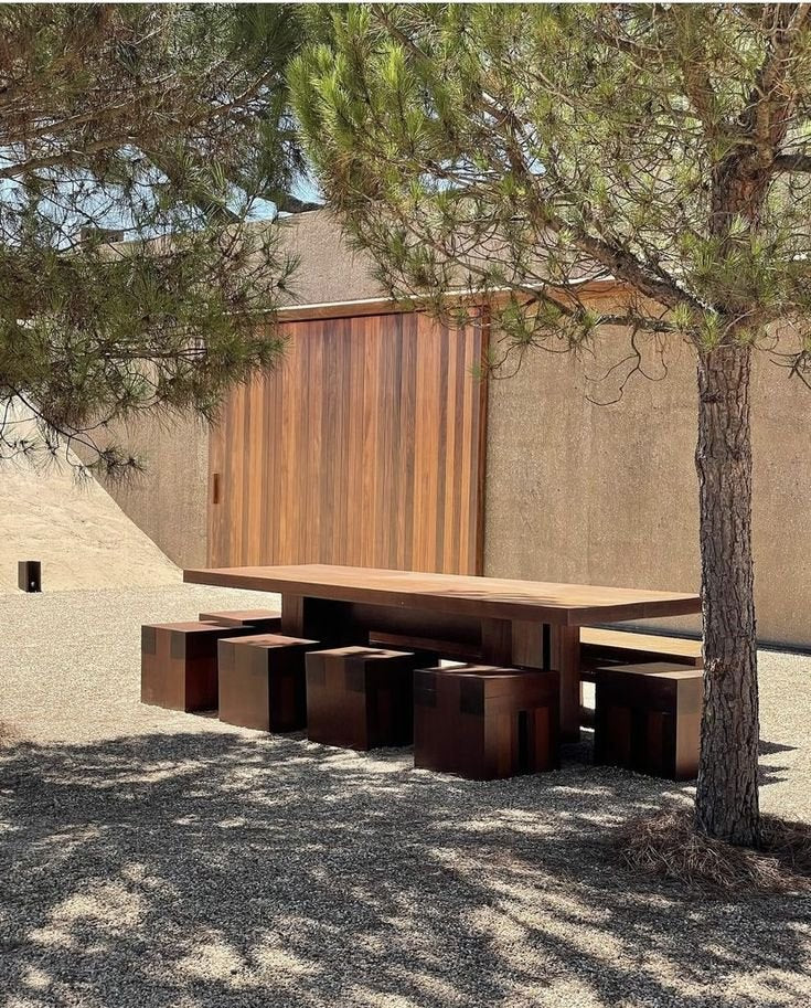 Outdoor dining table under the trees