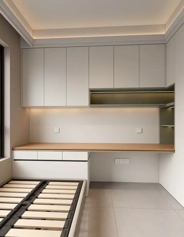 Compact bedroom layout with a bed frame, wardrobes, outlets, and desk area