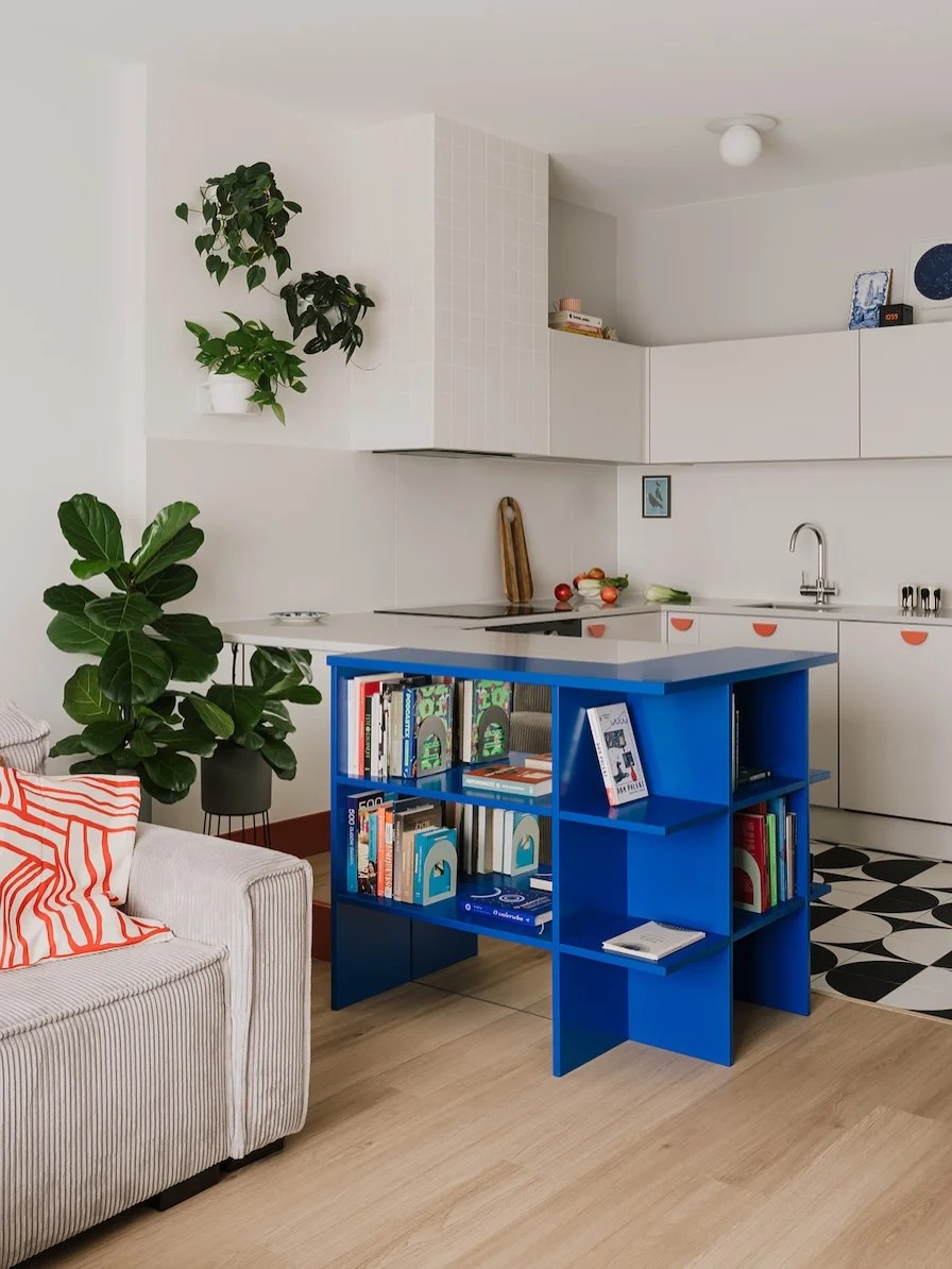 Use a bold island only when the main cabinets stay clean