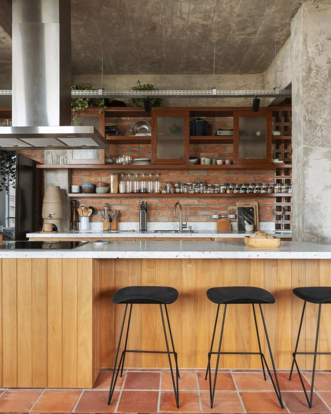 Use wood fronts to soften concrete and metal