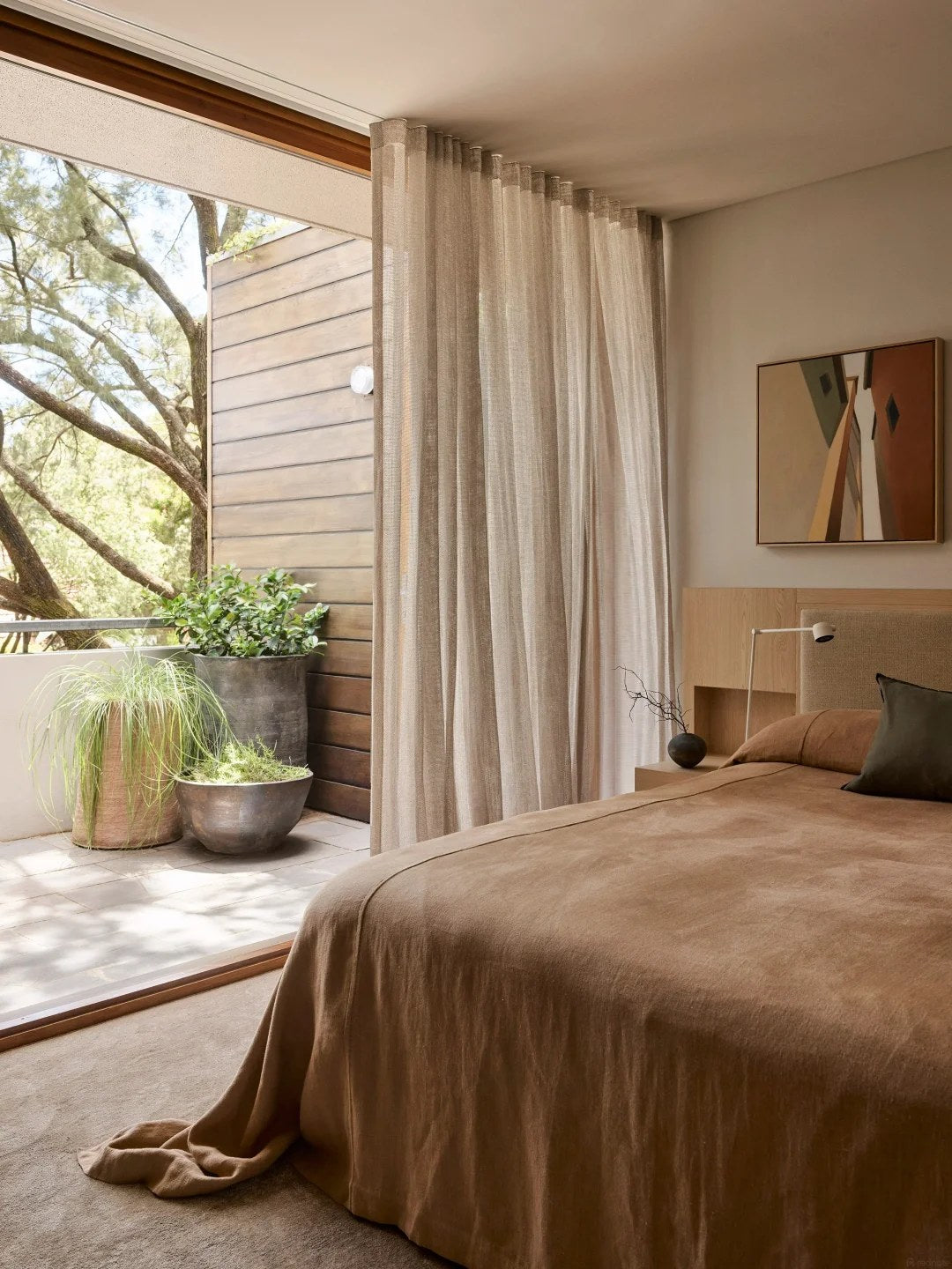 Let fabric soften a bedroom