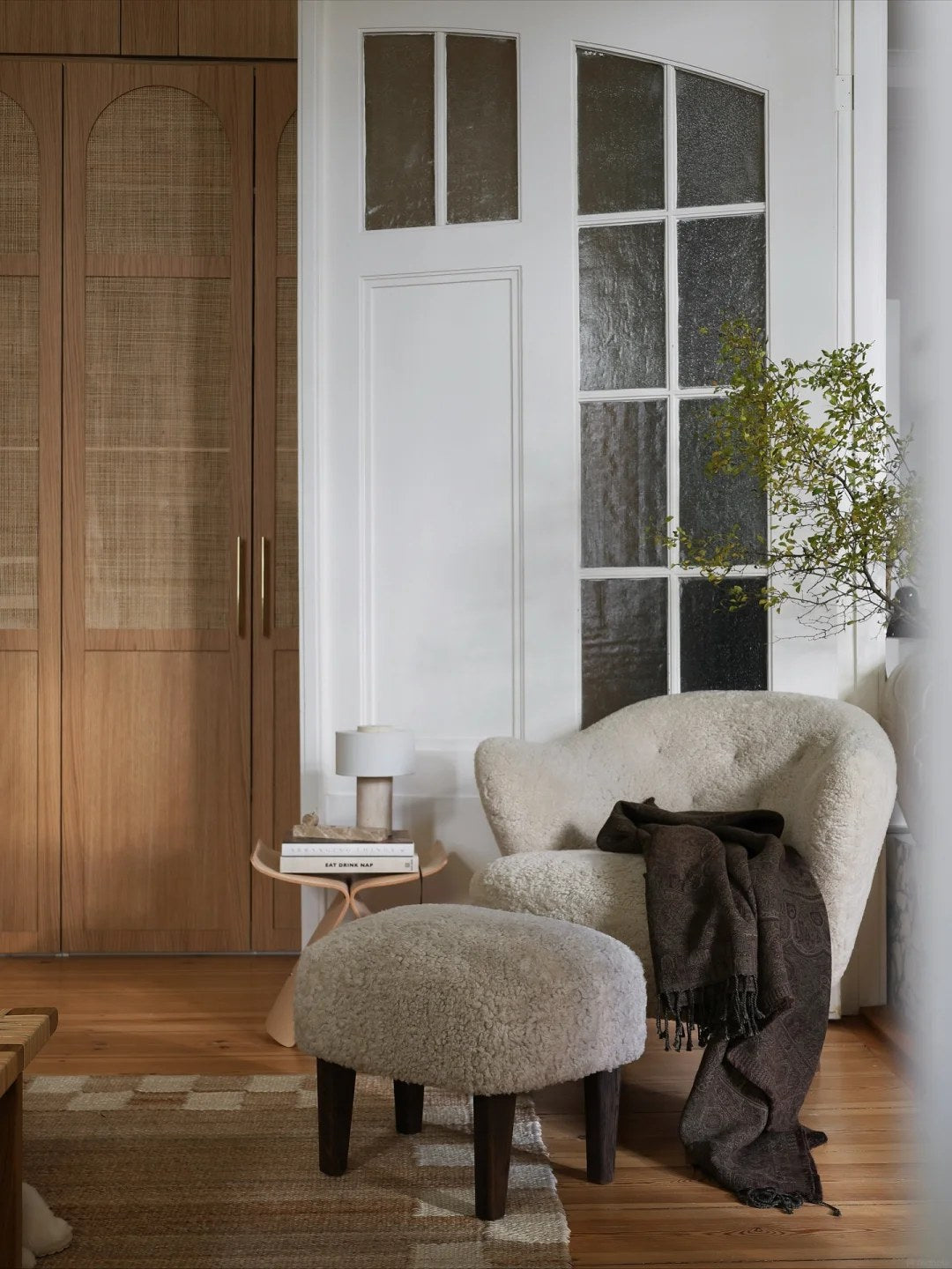 Use glass and wood doors to soften a storage transition