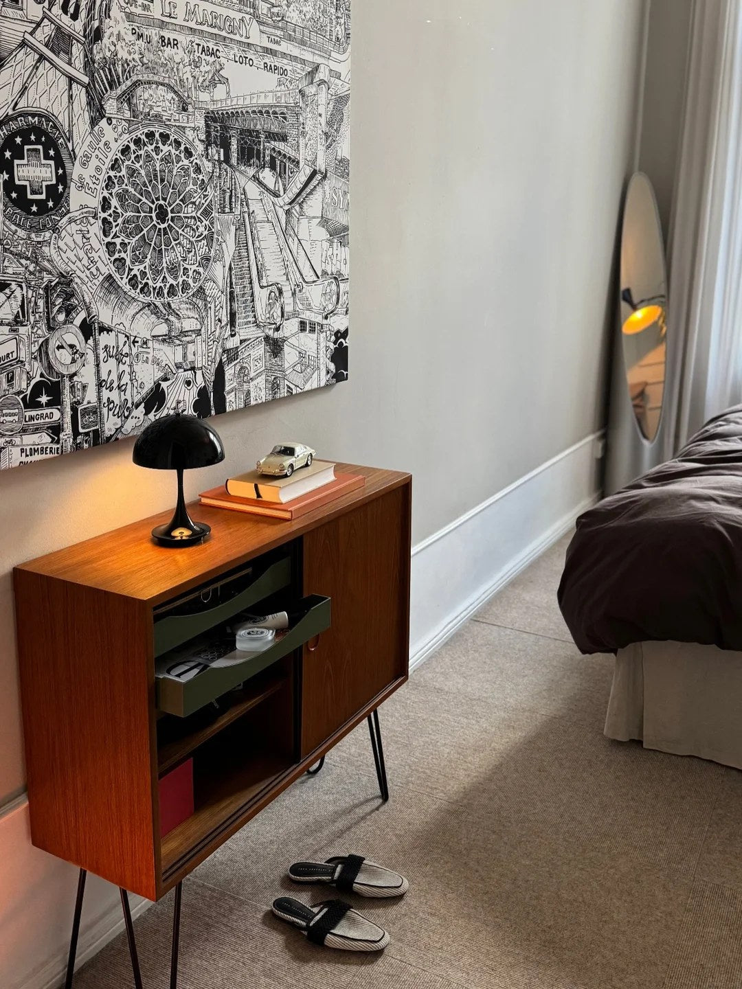 Let a low vintage cabinet replace a bulky dresser