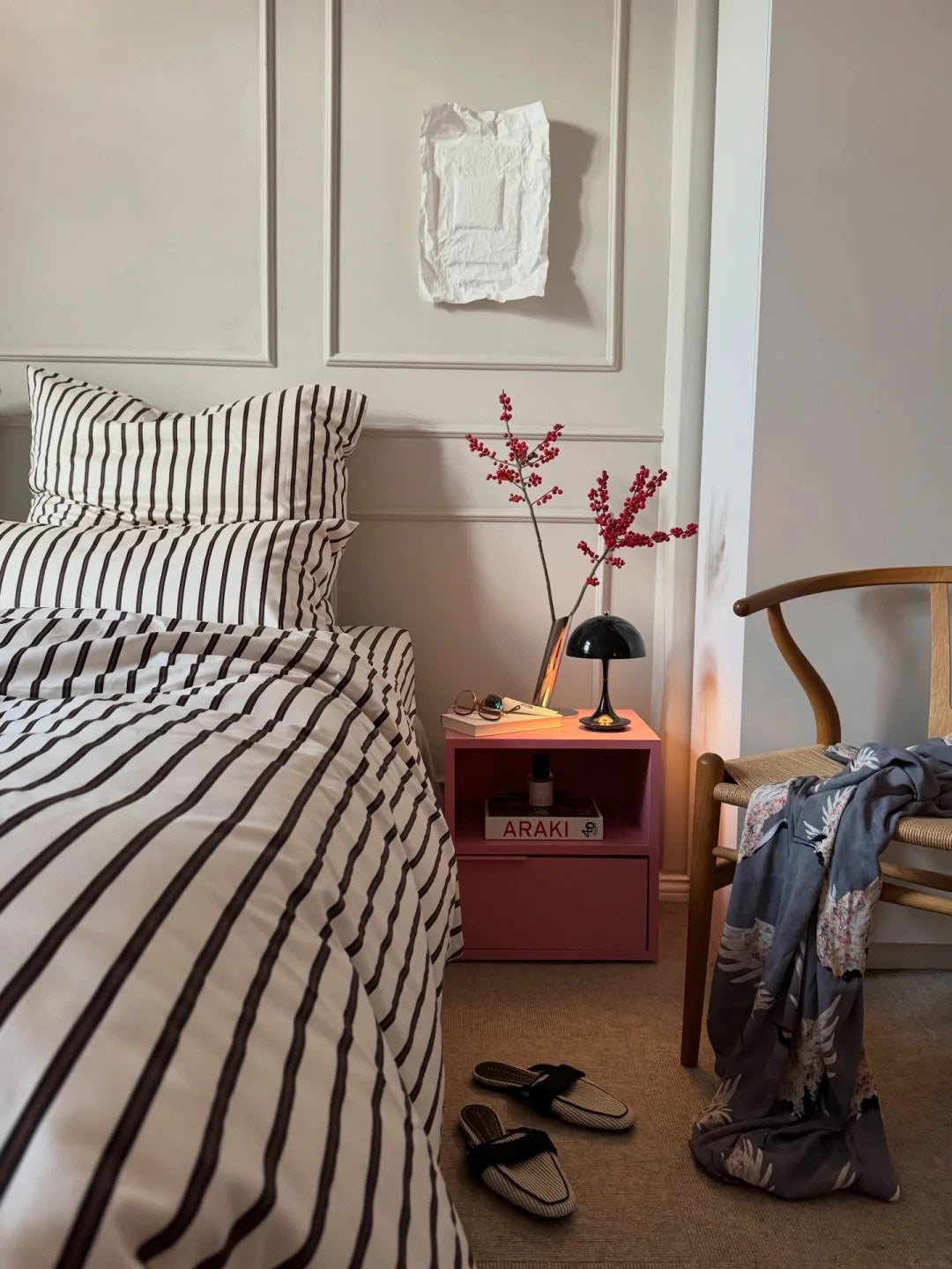 Use a small bedside cabinet for everyday clutter