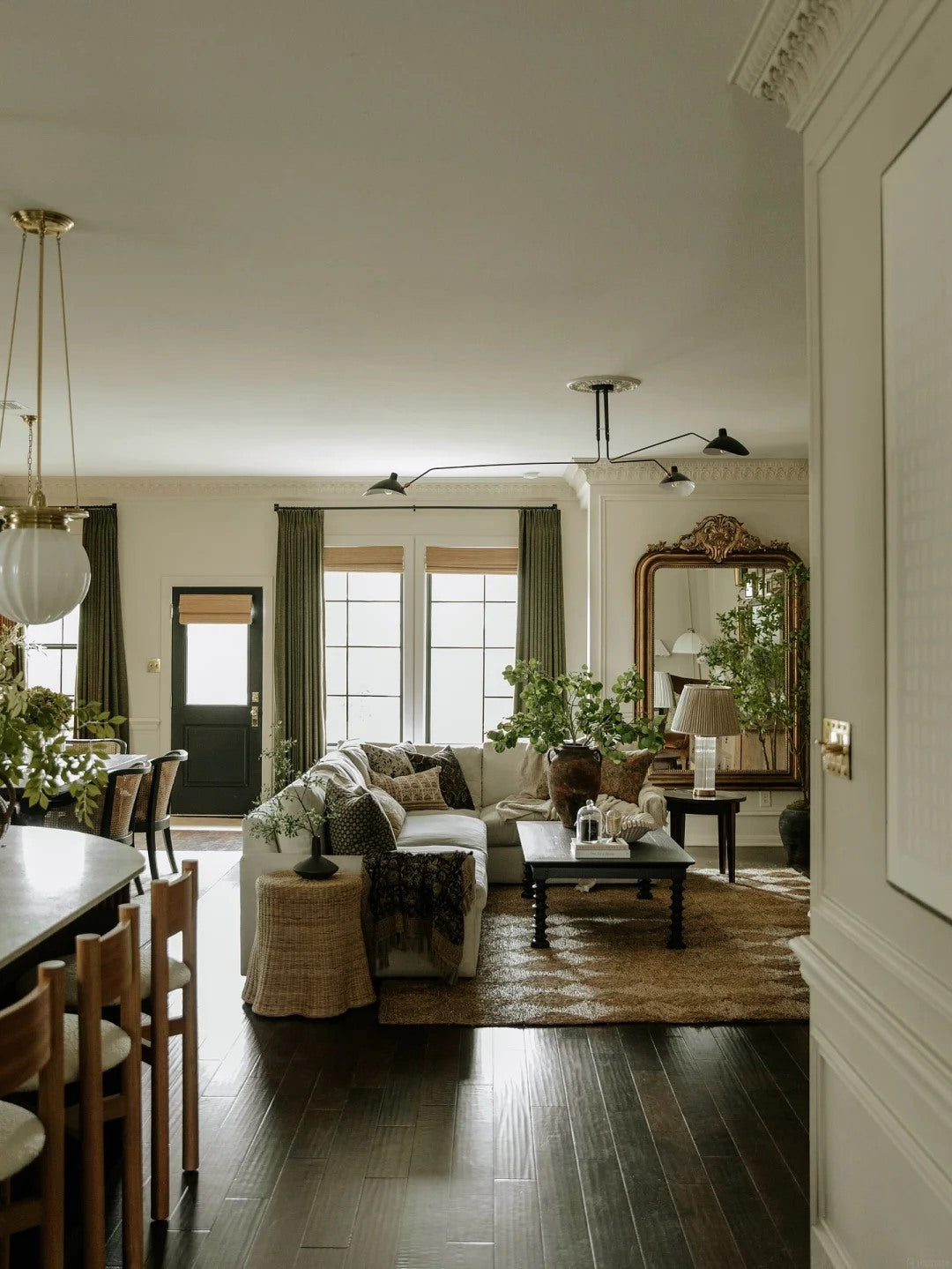 A colorful room still feels composed when the furniture lines are soft.