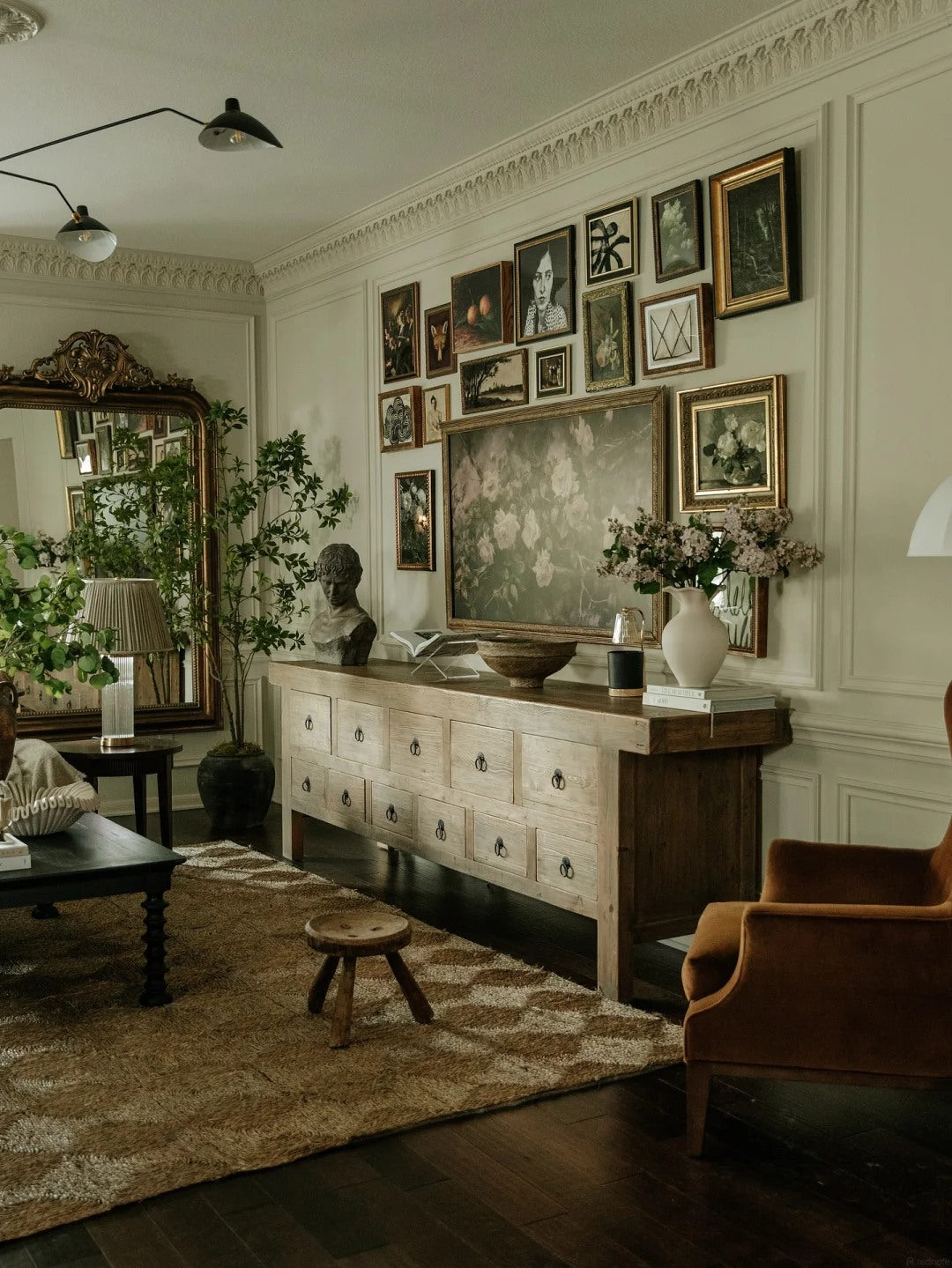 Vintage pieces make a modern living room feel more collected.