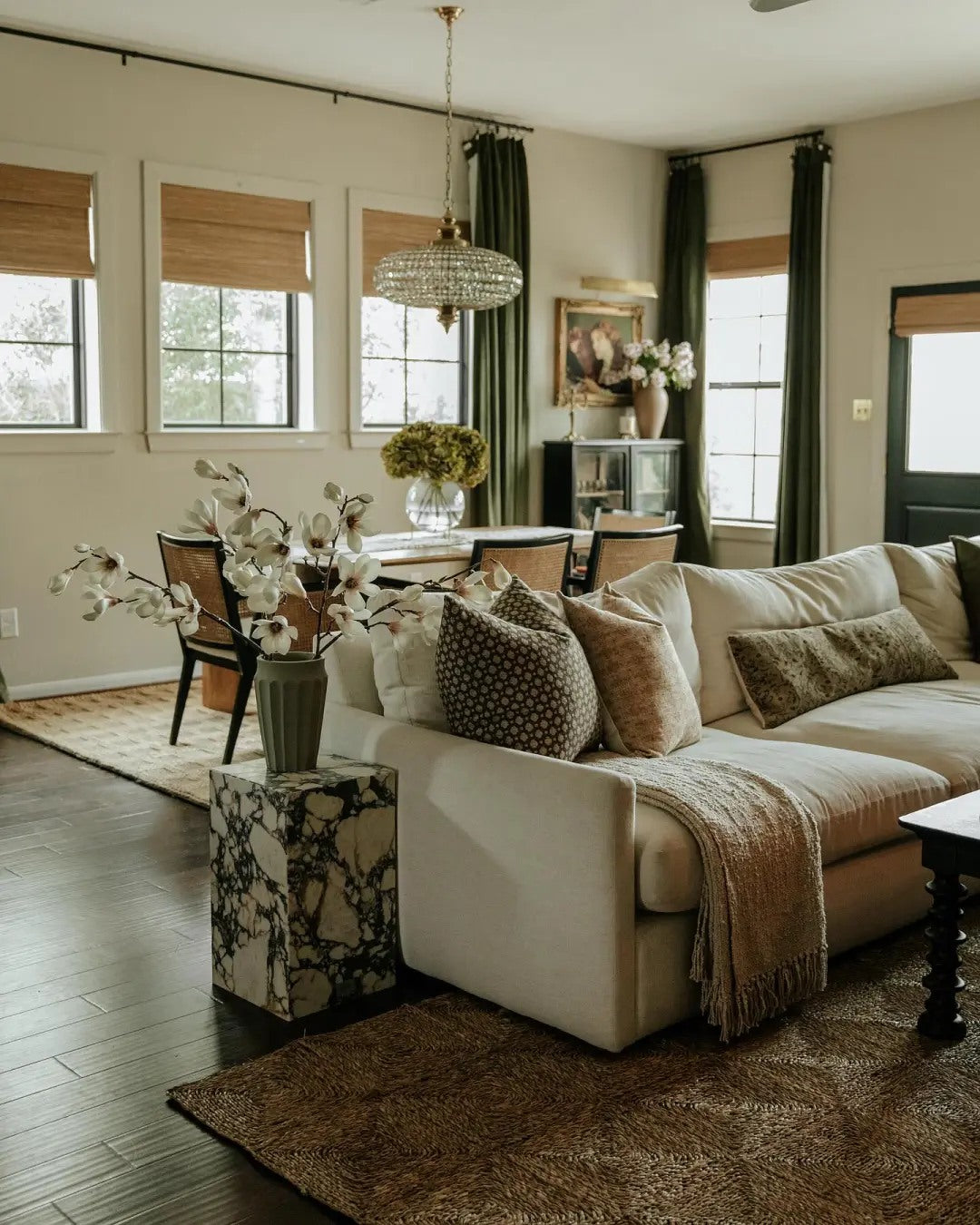 A gallery wall and substantial storage piece create a strong focal side.