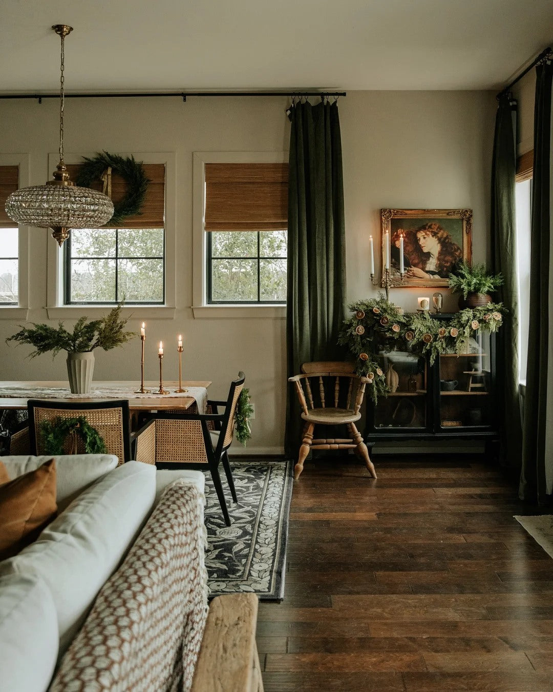 A sofa behind the main seating keeps an open room visually connected.