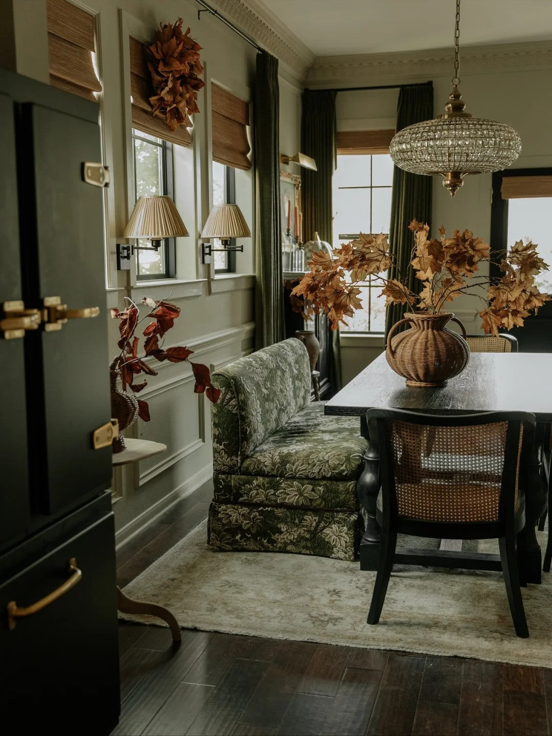 Plants, mirrors, and wood surfaces bring dimension to a quiet corner.